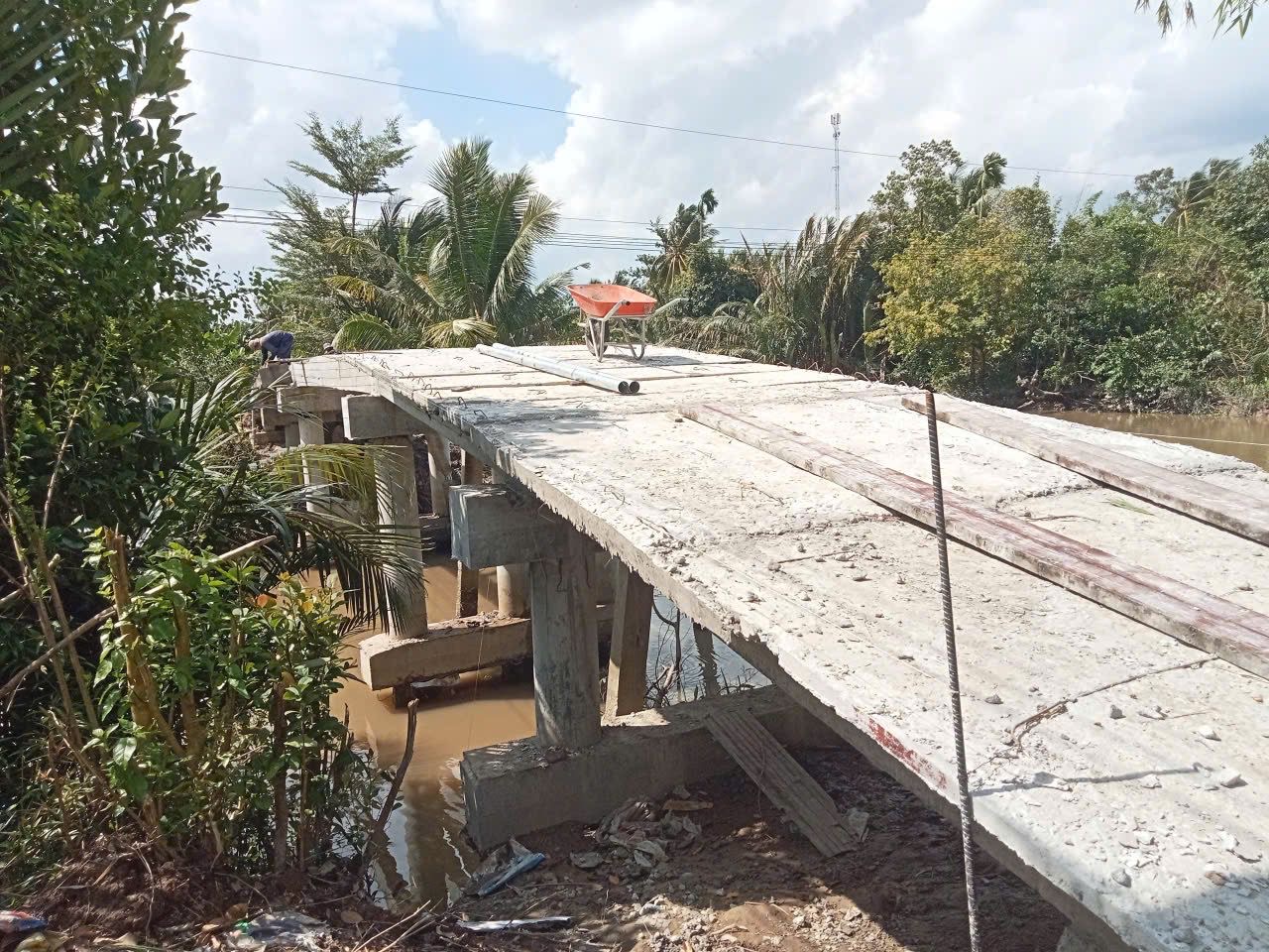 Bridge deck under construction with workers on site
