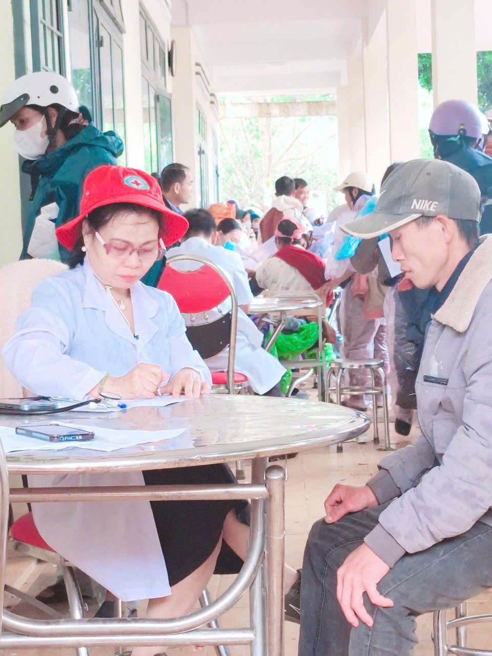 A doctor examining a patient at the mobile clinic