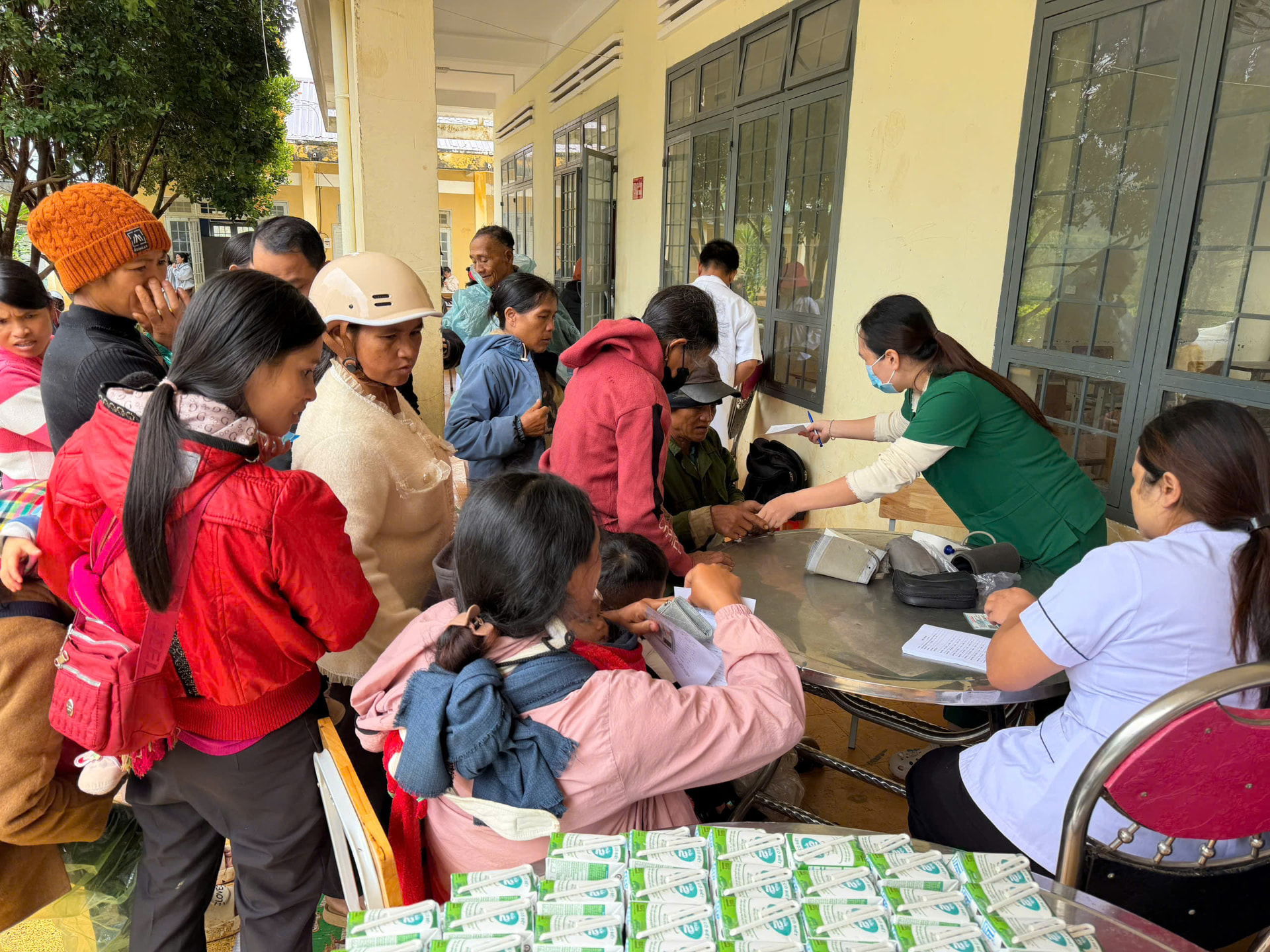 Nurses registering villagers for free health check-ups